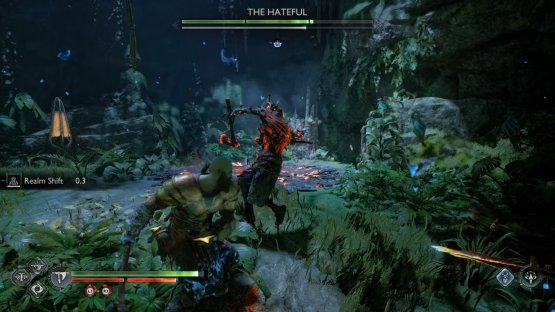 The Hateful in The Abandoned Village is surrounded by lesser Draugr in a glade of rock and trees.