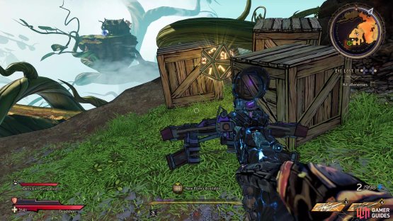 It will be hidden amongst some crates by the broken tower