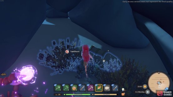 A half-buried chest can be found beneath the skeleton