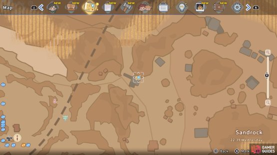 The chest is wedged in between the cliffside and the tower.