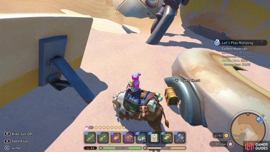 This chest is sitting between some pipes in the open.
