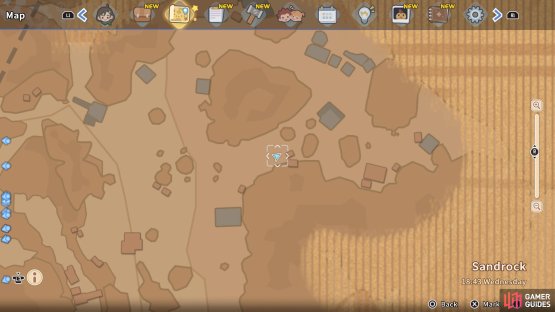 This chest is located down from the blue building in the cliff.