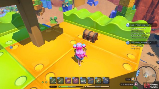 The chest is located on top of the toy windmill.