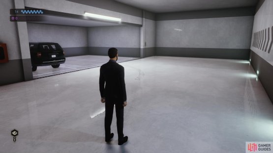 Make your way down to the garage and over to the black car