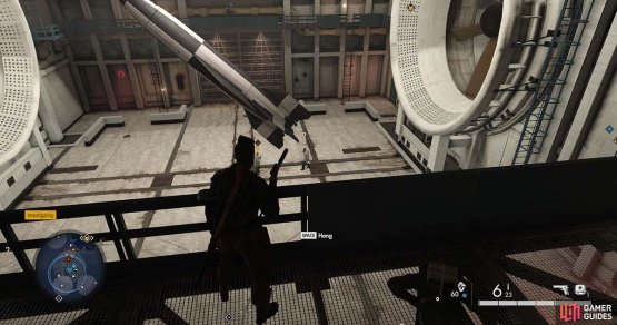Wait until his is under the rocket, then shoot one of the hooks holding it up. A sticky end for our Nazi friend.