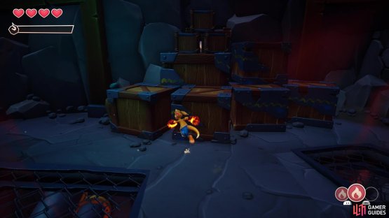 Bust through the smaller boxes on top of the crates