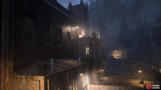 On the lower roof of the church in the Gotham City University.