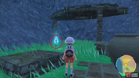 the blue stake sits on the ground amongst the ruins here.