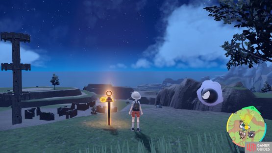 the orange stake is overlooking the nearby ruins.