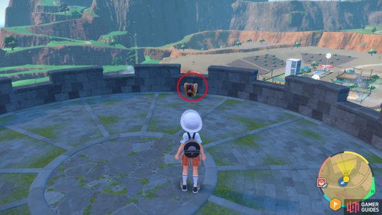 to find the  Gimmighoul Chest on top of the watchtower.