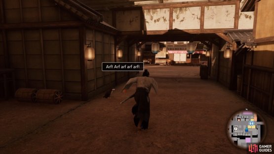 You should see the speech bubble of it barking as you get near it