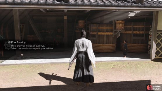 The boy will be standing right inside the one building