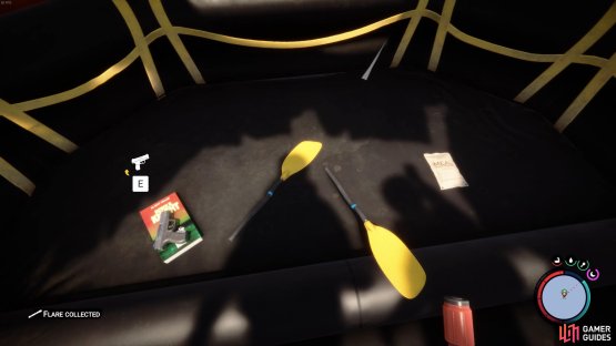 The Pistol can be found here inside the life raft.