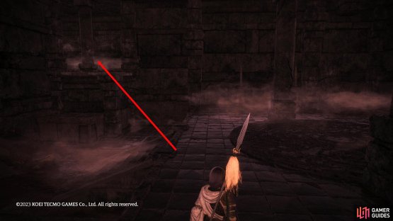 In the underground area, follow it until you reach two large statues guarding a big door.