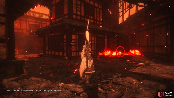Immediately turn left again to find the shell hidden in the corner among the fire.