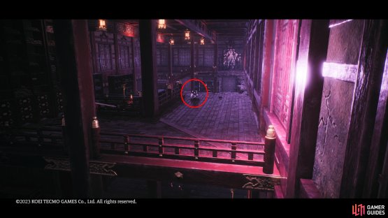 Turn left from the entrance to reach the upper floor then make your way to the center of the room.