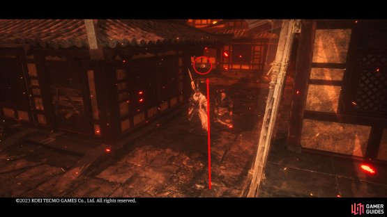 Follow the path towards the flames, and take a left to find the Shitieshou in the back.