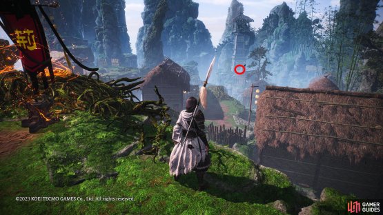 Make your way to the large watchtower at the back.