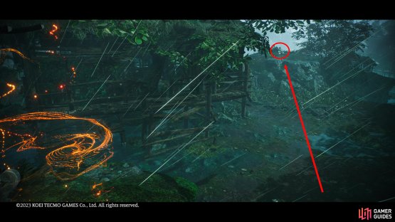 The Shitieshou will be opposite the flag, on the raised platform next to the dilapidated building.