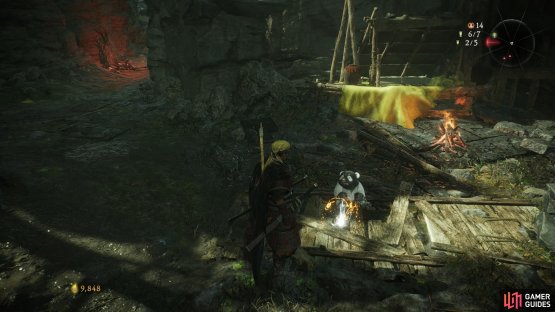 You need to drop the item close to the Shitieshou Demon before it will consume it.