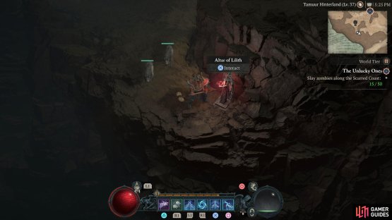 to find the the statue sitting near the rock face.
