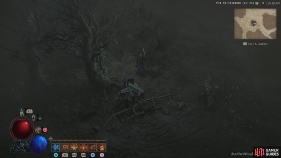 you will find the statue next to a tree.