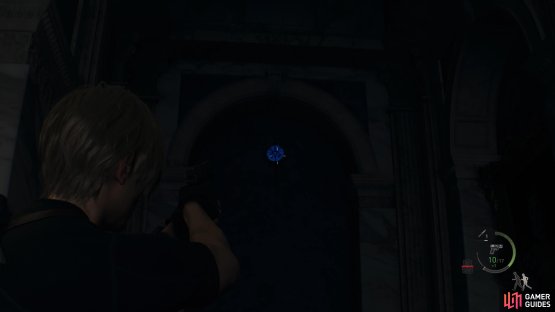 to find the first medallion hanging on the wall to the left of the gate.