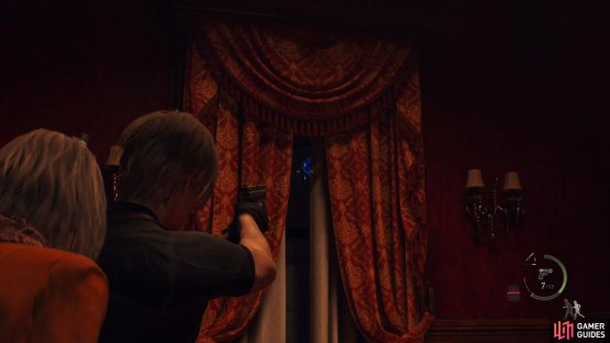to find the third medallion hanging behind the curtain.