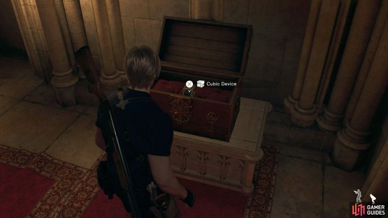 Follow the hallway to find a chest containing the Cubic Device.
