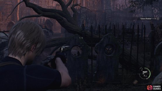 Look for the tombstones at the bottom of the graveyard and shoot the emblems to destroy them.