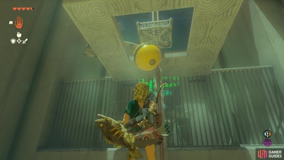 Use the bouncy ball to free the platform by pushing the wood platform out of the way