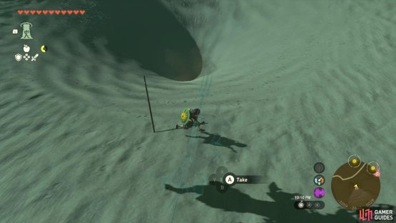 There will be a sinkhole right next to the campfire, which is where you need to go