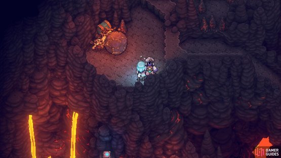 Blow the nearby boulder into the spikes to break them.