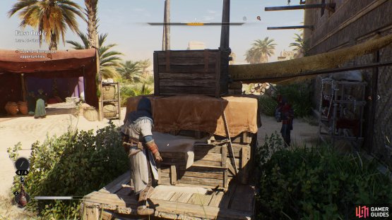 Climb the boxes and wooden beams to get onto the ramparts of the Caravanserai.