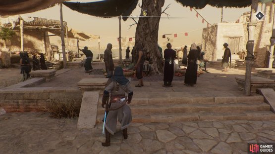 The artifact will be a bit south, held by an NPC under a large tree.