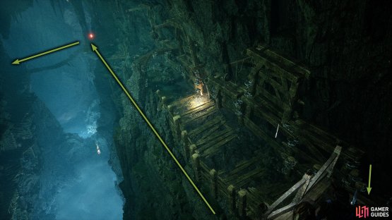 Drop off to the right then follow the path to the end. Now, light the fire before going across the bridge.