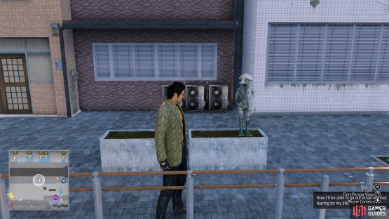 Simply walk up to this planter and look at the statue of the Kappa, then report back to finish the mission.