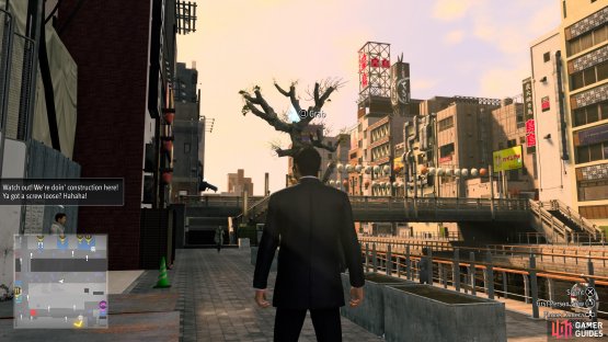 The key is on the tree, so use your Spider gadget to grab it.