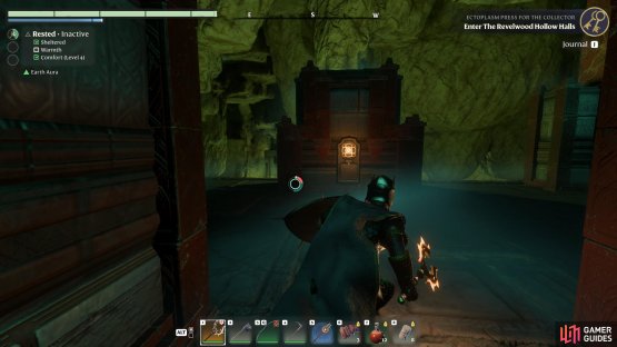 The second button can be found at the end of the hall behind the barrier.
