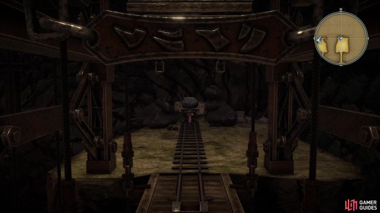 Hit the wall with the minecart to fill it with a boulder 