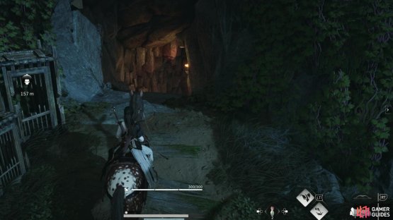 Head to the Encircling Lake and look for a cave entrance to the west side of the cliff to find the Snake Doctor location in Where Winds Meet. Image via Gamer Guides / NetEase.