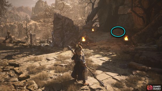 At the intersection, take the right path and search the container to your right.