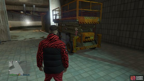 to find this action figure sitting near some collapsed scissor lift.. 