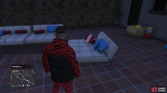 to find this action figure sitting on a chair.