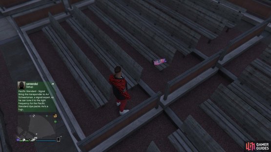to find the action figure sitting on a  bench.