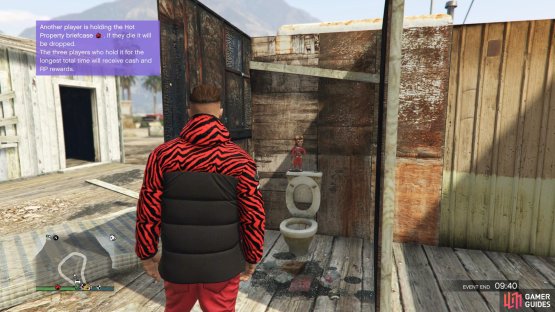 to find this action figure sitting on top of a toilet. 