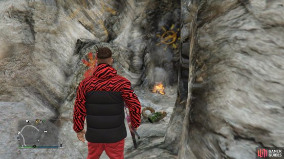 to find the action figure sitting in a cave.