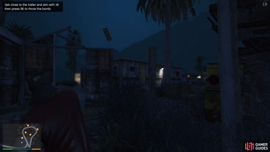 When you get within range of a trailer, throw the sticky bomb at it 