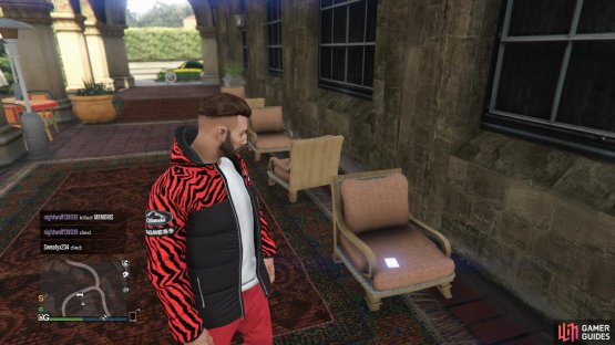to find the Playing Card sitting on a chair.
