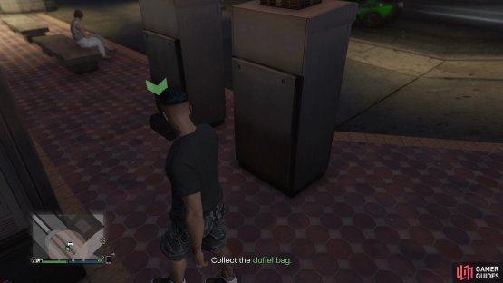 and steal the duffel bag from behind the ticket machine.